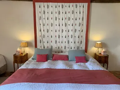 Un ou plusieurs lits dans un hébergement de l'établissement Château de la Faverie chambres d hôtes