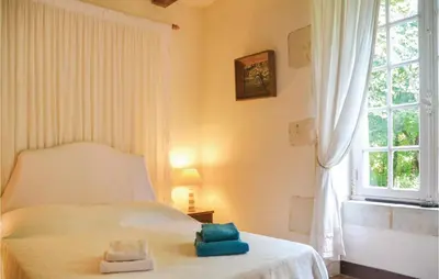 Un ou plusieurs lits dans un hébergement de l'établissement Holiday Home Luche Pringe O-925