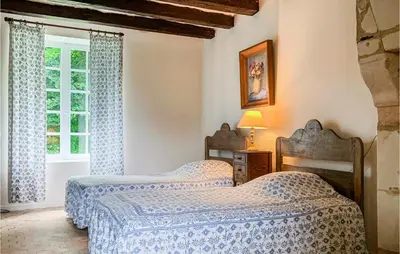 Un ou plusieurs lits dans un hébergement de l'établissement Holiday Home Luche Pringe O-925