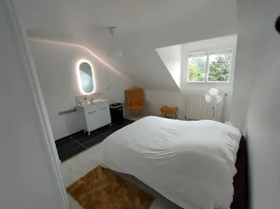 Un ou plusieurs lits dans un hébergement de l'établissement *Gîte Aux Grappes du Pressoir* à 2 km de Beauval
