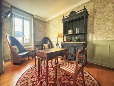 Coin salon dans l'établissement La Maison Voyage Bed and Breakfast