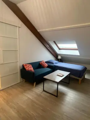 Coin salon dans l'établissement Appartement en résidence avec parking