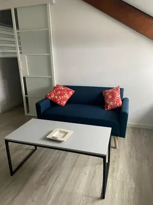 Coin salon dans l'établissement Appartement en résidence avec parking