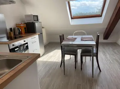 Cuisine ou kitchenette dans l'établissement Appartement en résidence avec parking