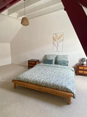 Un ou plusieurs lits dans un hébergement de l'établissement Maison - La campagne près de la ville