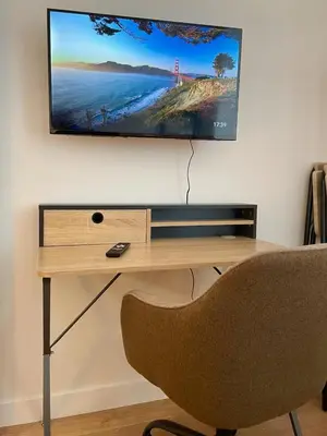 Télévision ou salle de divertissement dans l'établissement Cocon zen du clocher - SOnights