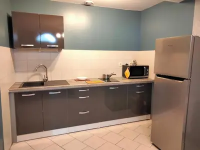 Cuisine ou kitchenette dans l'établissement Ferme de l'Etang - Gîte
