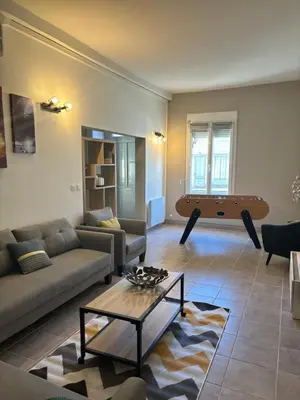 Coin salon dans l'établissement L'entre nous, Superbe Maison au centre de St Aignan