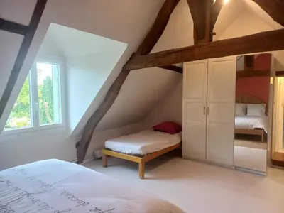 Un ou plusieurs lits dans un hébergement de l'établissement La ferme du bonheur