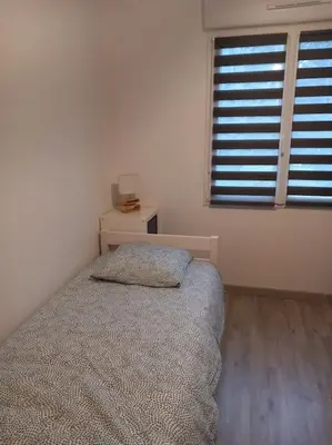 Un ou plusieurs lits dans un hébergement de l'établissement Maison de la croix Marion