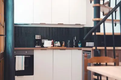 Cuisine ou kitchenette dans l'établissement Le Colimaçon