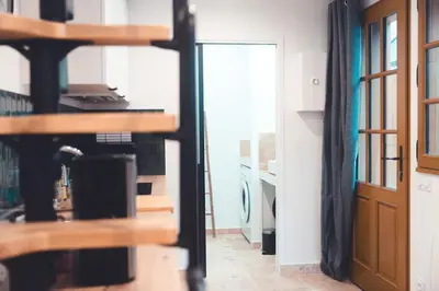 Cuisine ou kitchenette dans l'établissement L’Armoirie, cosy nid douillet