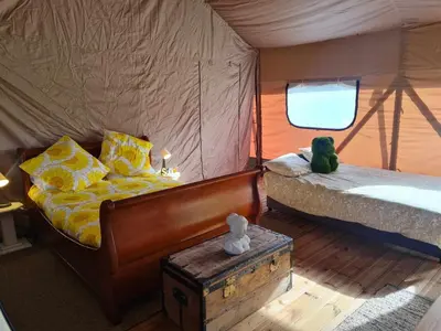 Un ou plusieurs lits dans un hébergement de l'établissement Camping de la touche