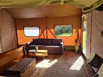 Coin salon dans l'établissement Camping de la touche