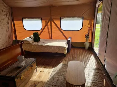 Un ou plusieurs lits dans un hébergement de l'établissement Camping de la touche