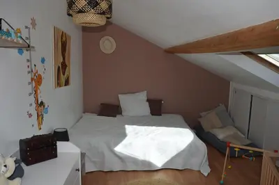 Un ou plusieurs lits dans un hébergement de l'établissement Location24hLemans