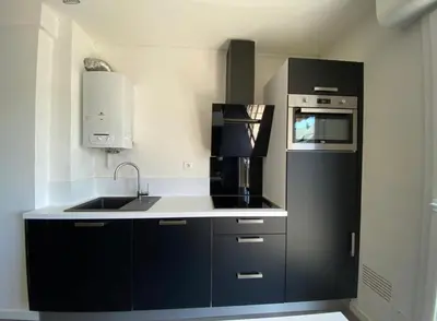Cuisine ou kitchenette dans l'établissement Vue sur les toits de Tours