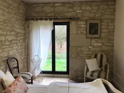 Un ou plusieurs lits dans un hébergement de l'établissement Le gîte du Bois de Sanzay