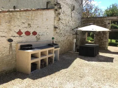 Terrasse ou espace extérieur de l'établissement Le gîte du Bois de Sanzay