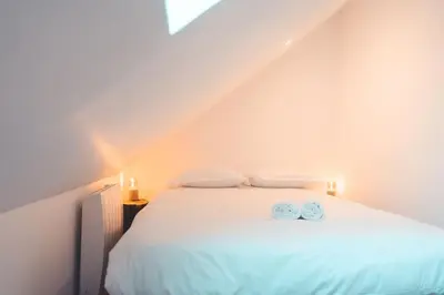 Un ou plusieurs lits dans un hébergement de l'établissement Le Baudelaire, T3 en duplex