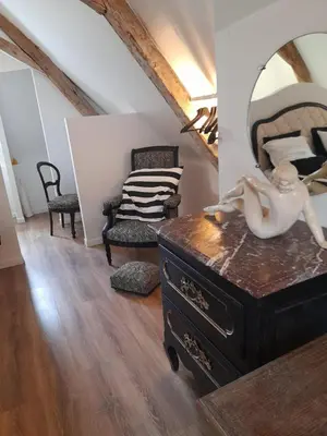 Coin salon dans l'établissement chambre d'hôtes dans un moulin du 16ème