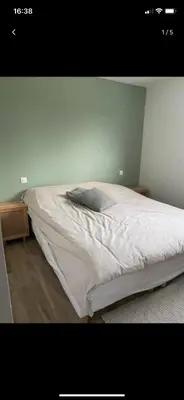Un ou plusieurs lits dans un hébergement de l'établissement Chambre proche circuit 24H