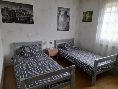 Un ou plusieurs lits dans un hébergement de l'établissement Villa Amazone