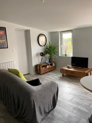 Télévision ou salle de divertissement dans l'établissement Le petite maison de la Motte