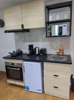 Cuisine ou kitchenette dans l'établissement 24h course/Moto/ Oasis / Antares