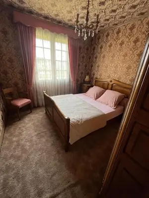 Un ou plusieurs lits dans un hébergement de l'établissement Spacieuse maison de village