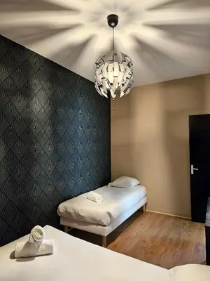 Un ou plusieurs lits dans un hébergement de l'établissement L'appartement Bilobou, 10 mn du ZooParc de Beauval