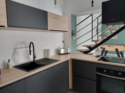 Cuisine ou kitchenette dans l'établissement Cosy Casa