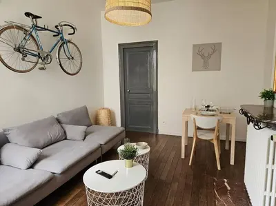 Coin salon dans l'établissement ARAGO1 - Appartement Tours centre sur jardin