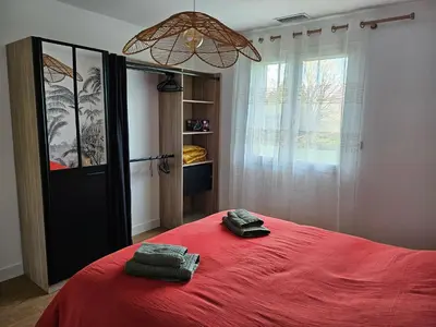 Un ou plusieurs lits dans un hébergement de l'établissement Maison a la campagne