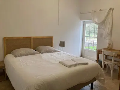 Un ou plusieurs lits dans un hébergement de l'établissement Cottage au calme entre vignes et champs, au coeur du pays des châteaux