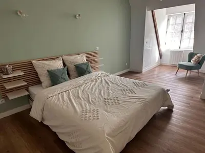 Un ou plusieurs lits dans un hébergement de l'établissement Appartement cœur de ville
