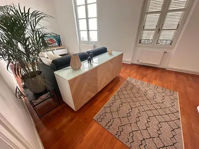 Coin salon dans l'établissement Appartement cœur de ville