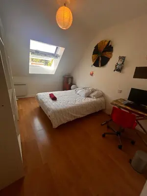 Un ou plusieurs lits dans un hébergement de l'établissement Maison calmer & confort
