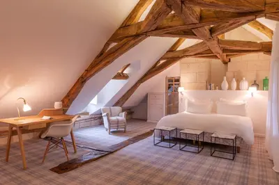 Un ou plusieurs lits dans un hébergement de l'établissement Le Domaine de Mestré, The Originals Relais