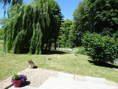 Jardin de l'établissement Charmante longère à Pouillé avec jardin et animaux acceptés - FR-1-491-339