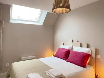 Un ou plusieurs lits dans un hébergement de l'établissement Gîte tout confort près du Zoo de Beauval avec jardin, terrasses et équipements modernes - FR-1-491-356