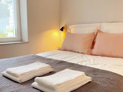 Un ou plusieurs lits dans un hébergement de l'établissement Gîte confort pour 2 avec jardin privatif près des châteaux et du Zooparc de Beauval - FR-1-491-368