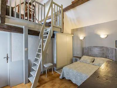 Un ou plusieurs lits dans un hébergement de l'établissement Gîte familial près des châteaux de la Loire avec jardin et jeux pour enfants - FR-1-491-390