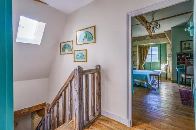 Un ou plusieurs lits dans un hébergement de l'établissement Maison de charme en Touraine avec jardin 4 p.