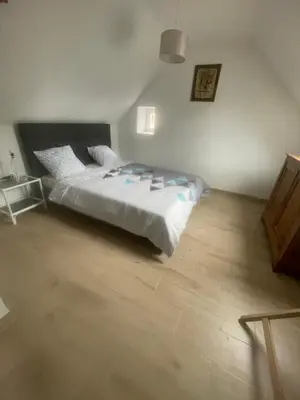 Un ou plusieurs lits dans un hébergement de l'établissement Maison de campagne 