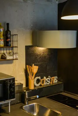 Cuisine ou kitchenette dans l'établissement Le Cœur De La Scellerie - Hypercentre - Netflix