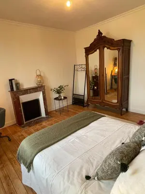 Un ou plusieurs lits dans un hébergement de l'établissement Maison Coeur centre ville Arnage 24h du Mans