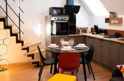 Cuisine ou kitchenette dans l'établissement Appartements plein centre, à 5 minutes du château