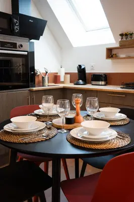 Cuisine ou kitchenette dans l'établissement Appartements plein centre, à 5 minutes du château