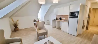 Cuisine ou kitchenette dans l'établissement Résidence de Châtelleraut